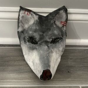 White and gray wolf 6 inches tall and 7 1/2 inches long